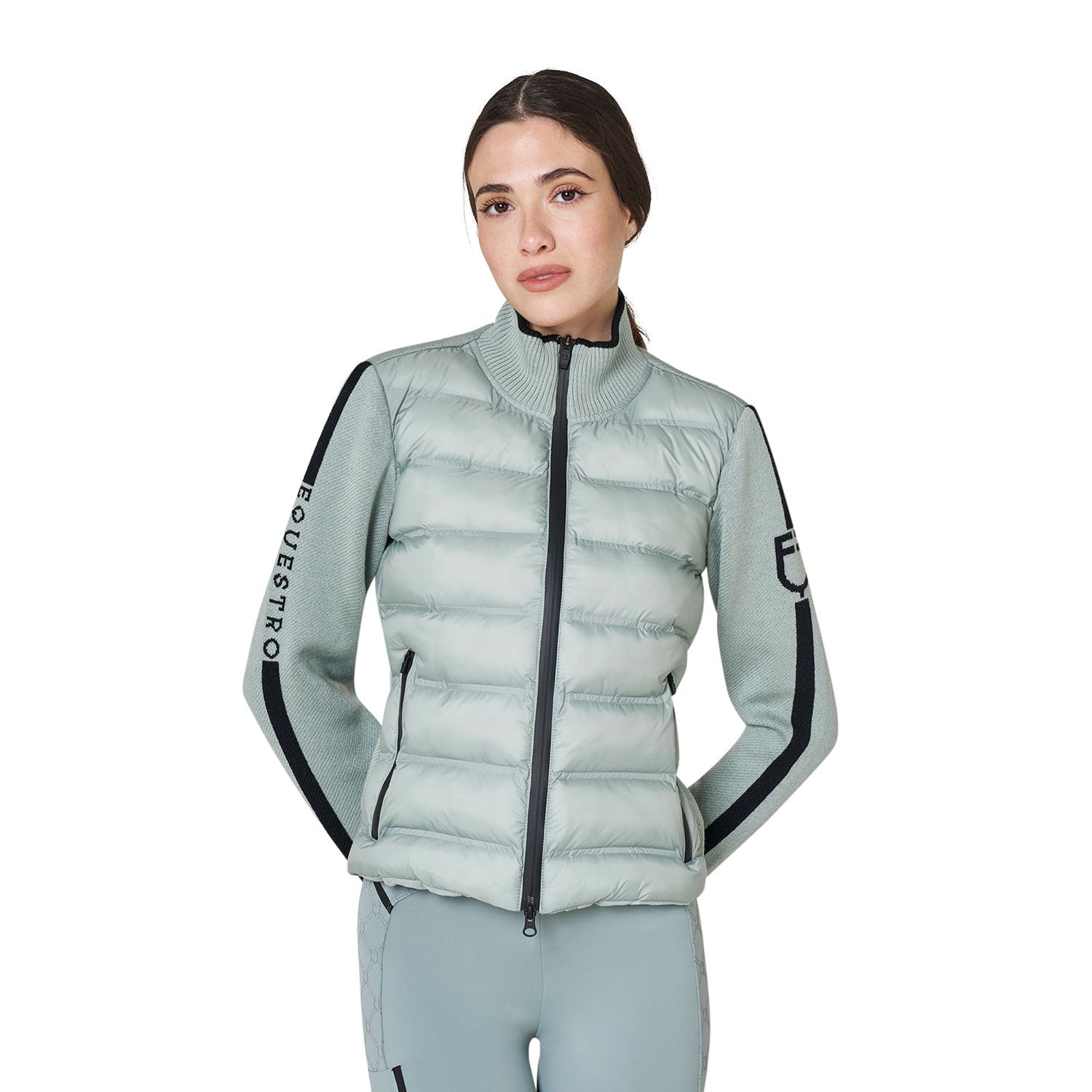 Front view of a female model wearing the Slate Gray Equestro Nylon and Knit Zip Jacket on a plain background