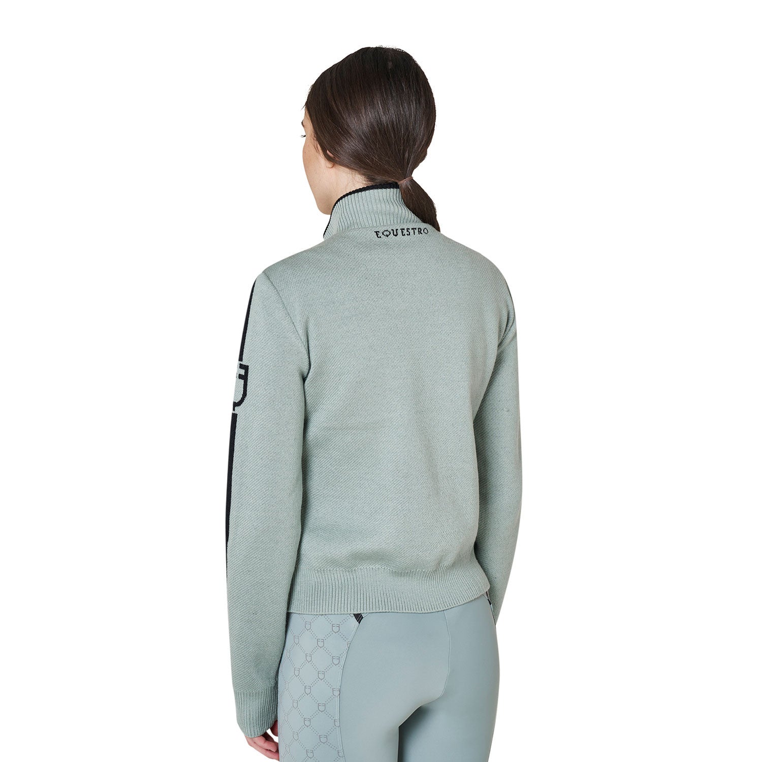 Back view of a female model wearing the Slate Gray Equestro Nylon and Knit Zip Jacket on a plain background