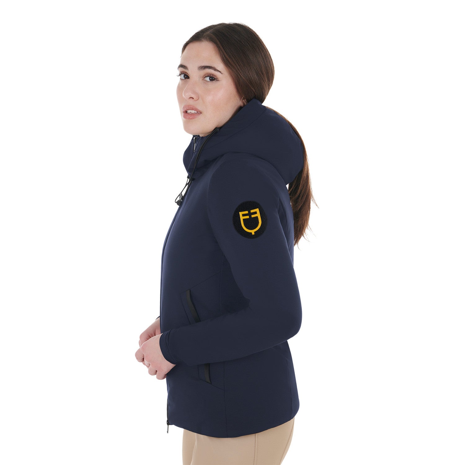 Side view of a female model wearing the Navy Blazer Equestro Water & Wind Repellent Down Jacket on a plain background