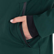 Close-up view of the zip pocket on the Pine Grove Equestro Water & Wind Repellent Down Jacket as worn by a female model