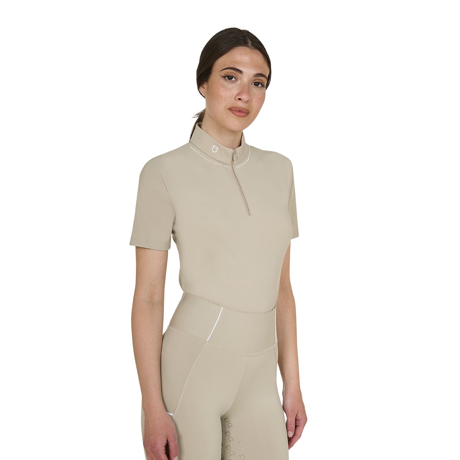Front view of model wearing the Equestro Women's Slim Fit Training Polo Shirt With Zip And Collar Beads in tan on white background