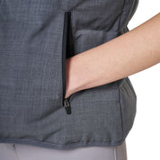 Close-up view of the zipper pocket on the Grey Melange Equestro Quilted Wool Vest as worn by a female model