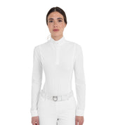 Front view of a female model wearing the White Equestro Perforated Long-Sleeve Competition Polo Shirt on a plain background