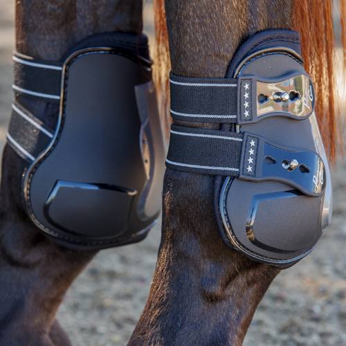 Close-up side view of a horse wearing a pair of Black Snap Professional's Choice Pro Performance Open Rear Boots