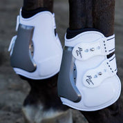 Close-up angled back view of a horse wearing the Snap Professional's Choice Pro Performance Open Rear Boot on a white background