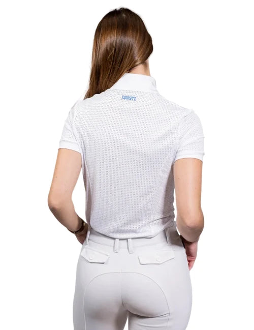 Woman wearing a white equestrian shirt and pants on a white background