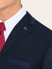 Close-up front view of the lapel on the Navy RJ Classics Hudson Men's Mesh Coat on a plain background