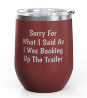 Front view of the Red Backing Up The Trailer Unsustainable Equestrian Wine Tumblers on a plain background