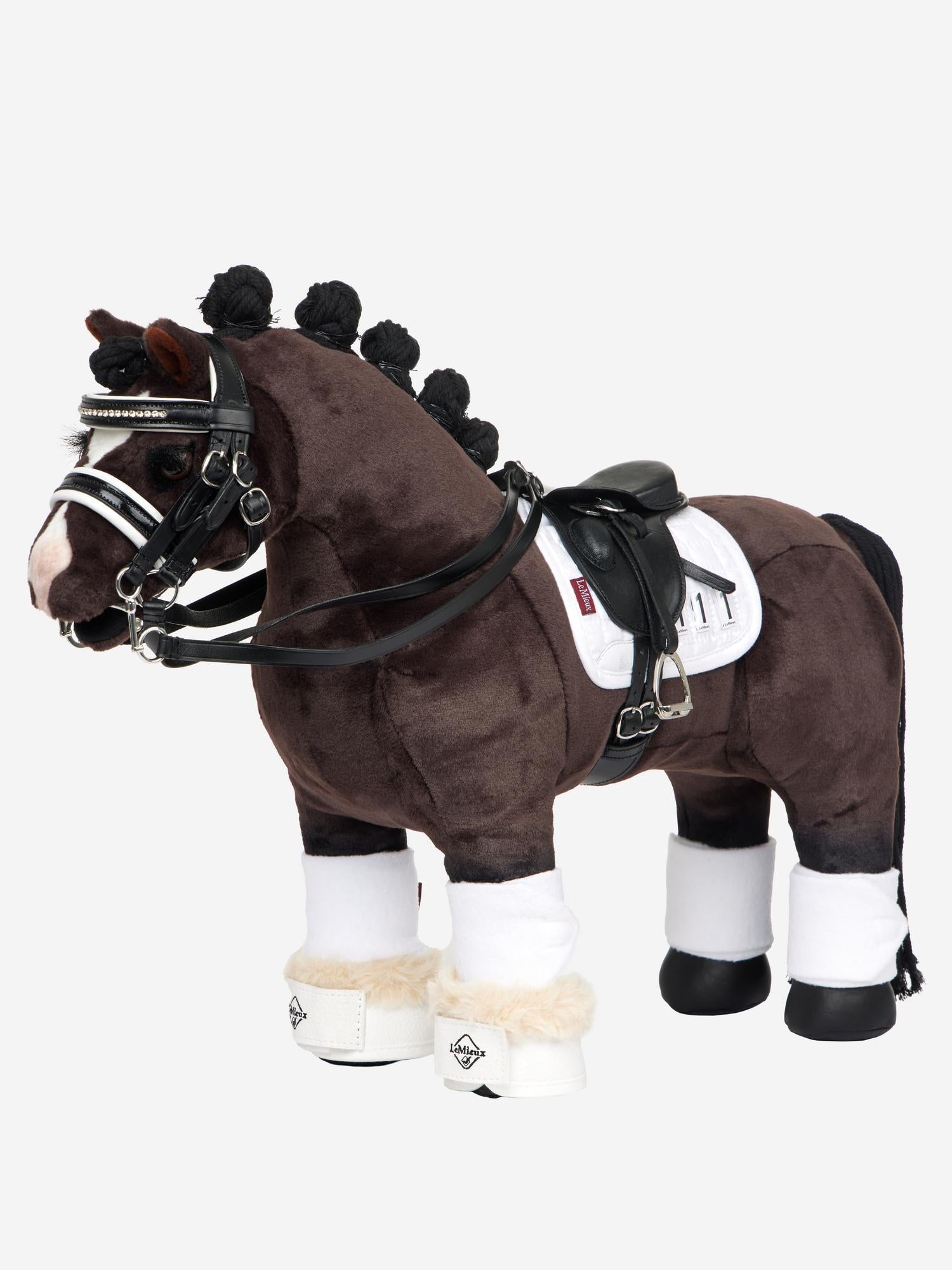 Side view of a bay toy pony wearing the Black Toy Pony Double Bridle and coordinating tack on a plain background