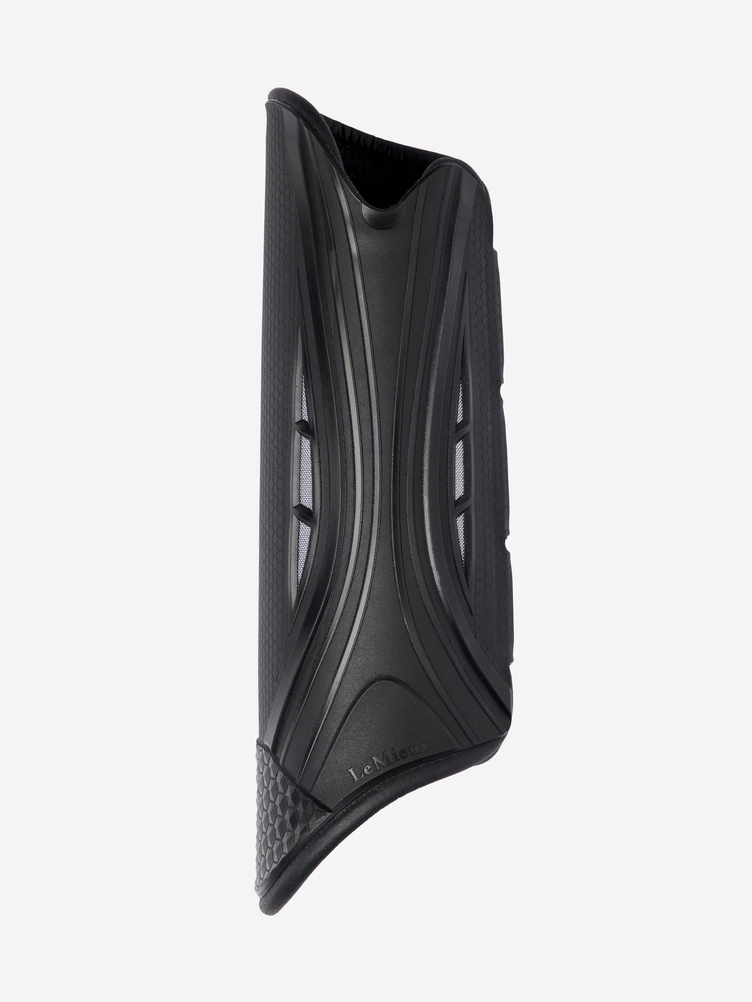 Side view of the LeMieux MIMsafe XC Hind Boot on a plain background