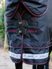 Close-up front view of the chest closures on the Black LeMieux Arika Storm-Tek 350G Rug