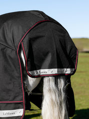 Close-up view of the tail flap on the Black LeMieux Arika Storm-Tek 350G Rug
