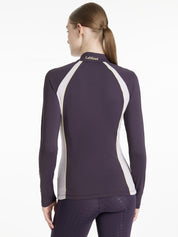 Back view of a female model wearing the Juniper LeMieux Philippa Mesh Base Layer on a plain background