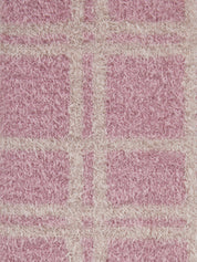Close-up view of the pattern on the Wild Rose LeMieux Heritage Check Fluffies
