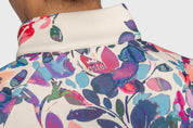 Closeup back view of a model wearing the Kastel Amethyst Watercolor Floral Scuba 1/2 Zip Pullover showing the Kastel logo below the collar