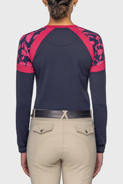 Back view of a model wearing the Kastel Navy & Hot Pink French Tulips Long Sleeve Crewneck Sun Shirt on a plain background