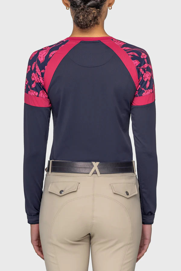 Back view of a model wearing the Kastel Navy & Hot Pink French Tulips Long Sleeve Crewneck Sun Shirt on a plain background