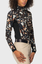 Angled front view of a model wearing the Kastel Neutral Modern Begonia 1/4 Zip Long Sleeve Sun Shirt on a plain background