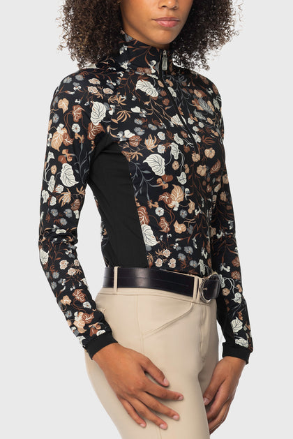 Angled front view of a model wearing the Kastel Neutral Modern Begonia 1/4 Zip Long Sleeve Sun Shirt on a plain background