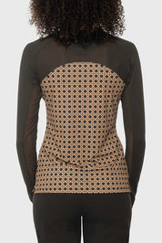 Back view of a female model wearing the Kastel Camel Basketweave 1/4 Zip Long Sleeve Power Mesh Raglan Sun Shirt on a plain background