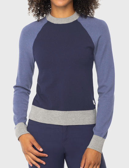 Front view of a female model wearing the Kastel Navy, Blue, & Gray Crewneck Colorblock Sweater on a plain background