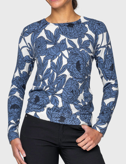 Front view of a female model wearing the Pacific Blue Wild Rose Kastel Crewneck Sweater on a plain background