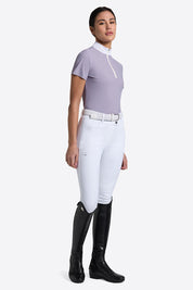 Light purple short sleeved quarter zip show shirt shown with white collar and zipper on model on plain white background