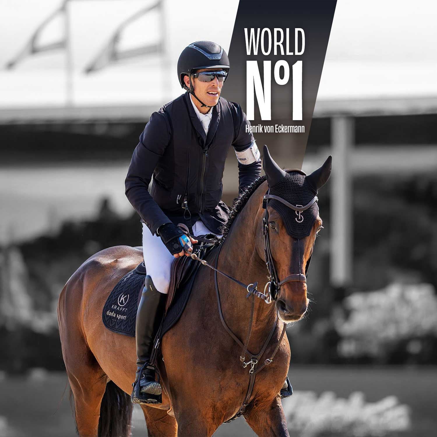 Front view of Henrik von Eckermann wearing the Black Seaver Safefit Airbag Vest while riding a horse