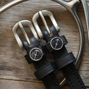 View of the Sagittarius Mane Jane Spur Straps on a wood background