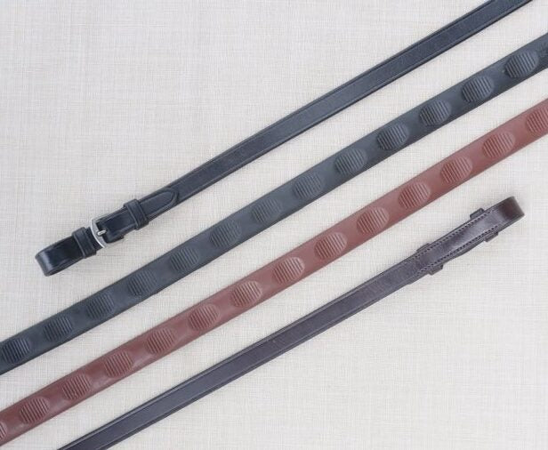 8" Thumb Grip Reins on a patterned background