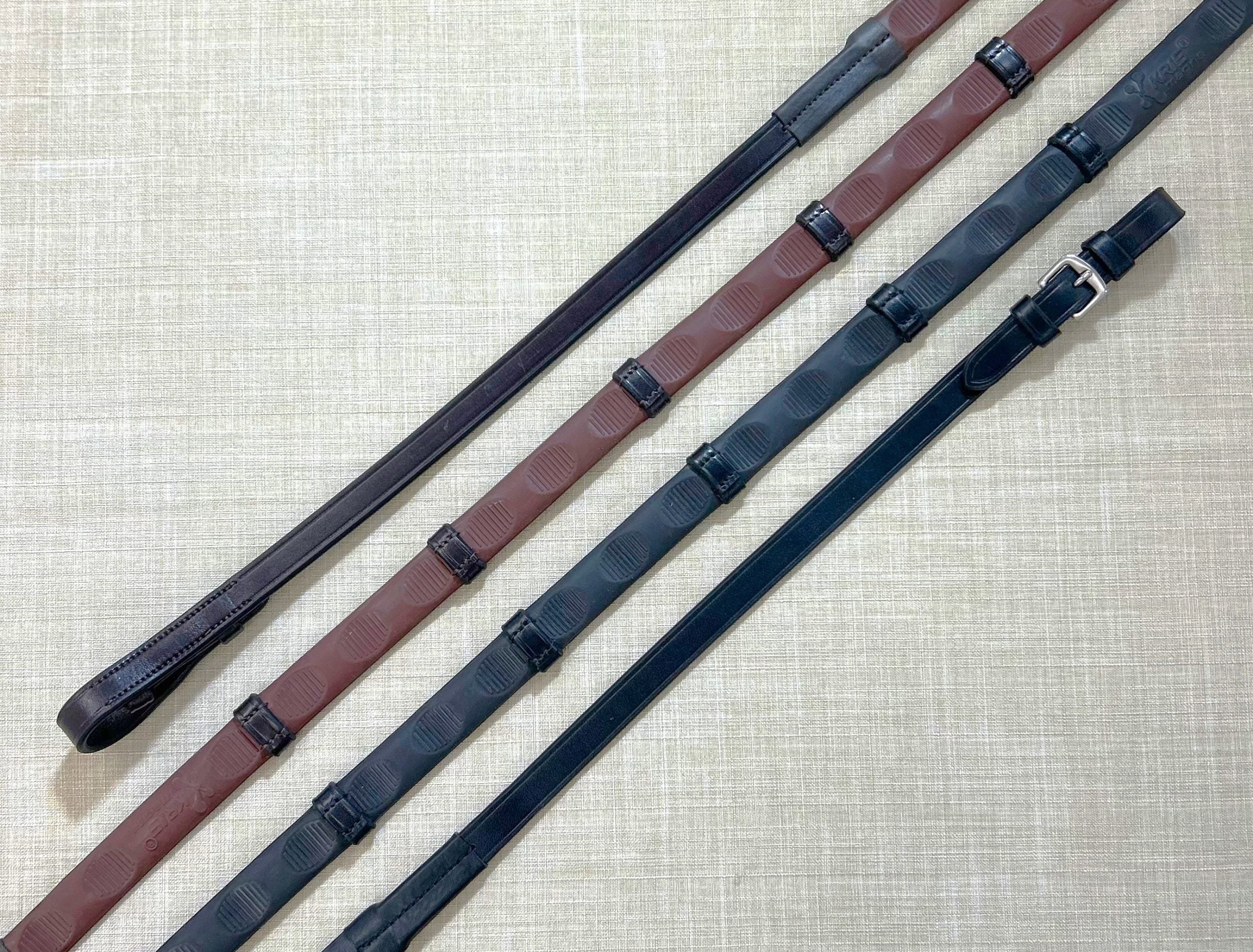 8" Thumb Grip Reins with Stops on a textured background