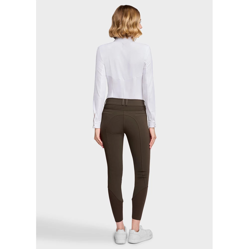 Full body back view of a female model wearing the Mocha Samshield Chloe 3D Full Grip Breeches and white shirt on a plain background