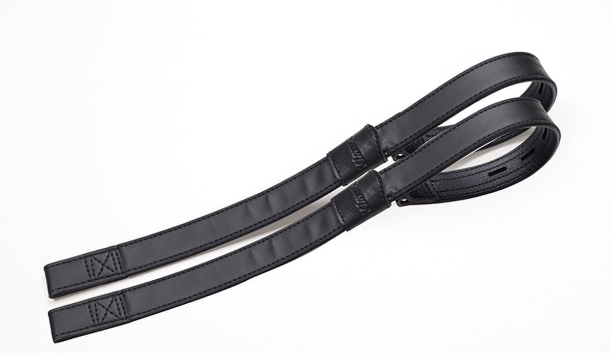 View of a pair of Black Wintec Webbers on a white background