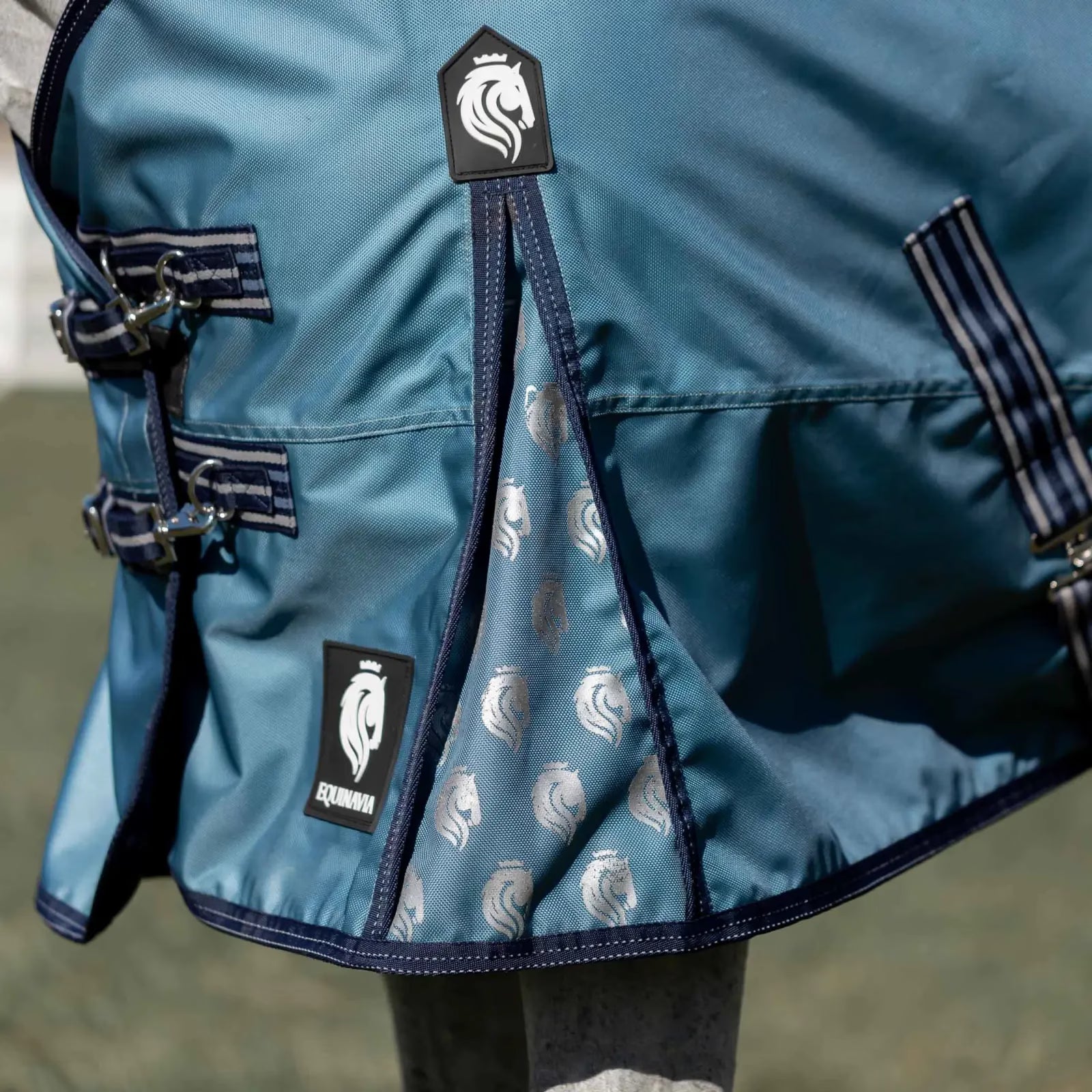 Close-up view of shoulder gusset on the Equinavia Thunder 360 0g Detachable Neck Turnout Sheet in blue