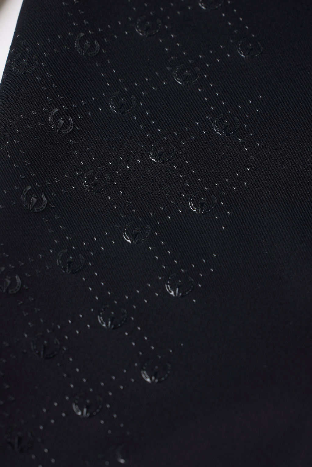 Closeup view of the Black Kerrits Free Motion Coolcore Knee Patch Breech showing the silicone grip
