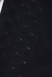 Closeup view of the Black Kerrits Free Motion Coolcore Knee Patch Breech showing the silicone grip