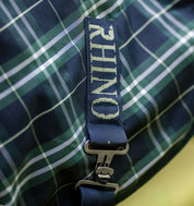 Close-up view of the RHINO logo on the surcingle attachment on the Hunter Check/Green & Navy Horseware Rhino Plus Turnout 0g