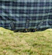 Close-up view of the 3 crossed surcingles on the Hunter Check/Green & Navy Horseware Rhino Plus Turnout 0g