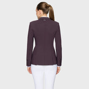 Back view of a female model wearing the Black Cherry Samshield Alexia Show Coat on a plain background