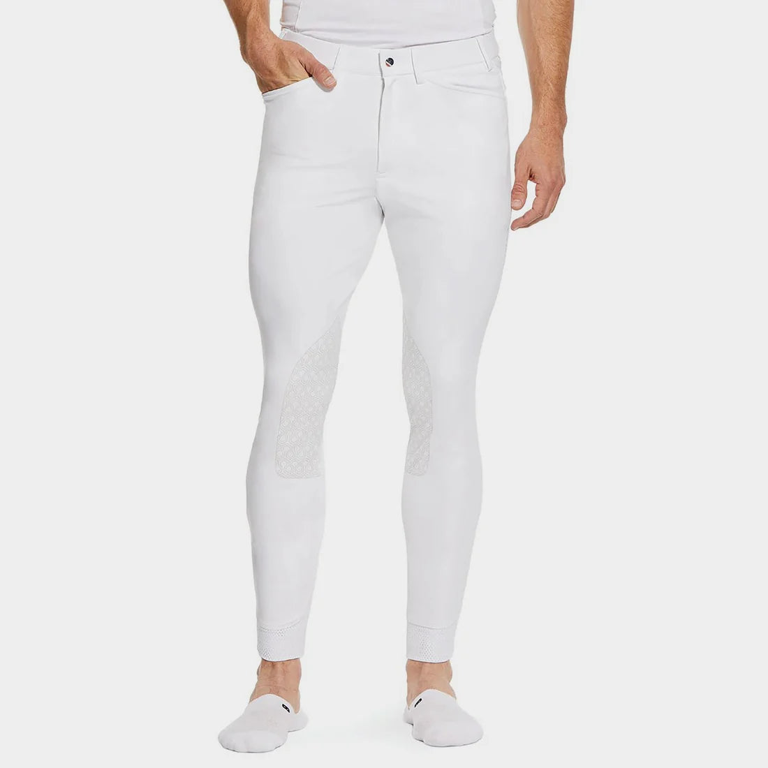 Front view of a male model wearing the White Ariat Men's Tri Factor Knee Patch Breeches on a plain background