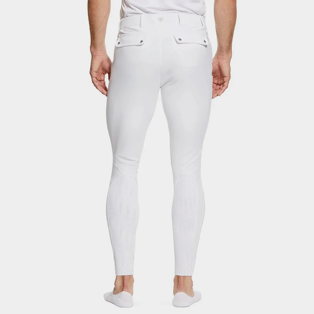 Back view of a male model wearing the White Ariat Men's Tri Factor Knee Patch Breeches on a plain background