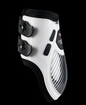 View of a white Premier Equine Carbon Pro Fetlock Boots on a black background