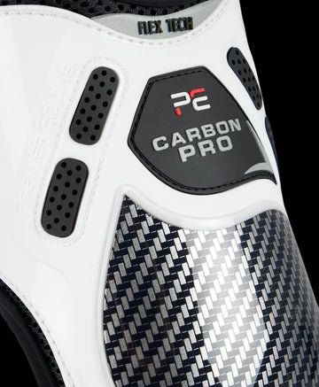 Close-up view of a white Premier Equine Carbon Pro Fetlock Boot on a black background
