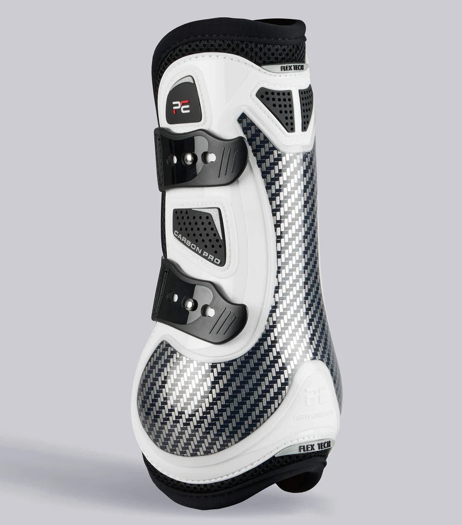 View of a white Premier Equine Carbon Pro Tendon Boot on a plain background