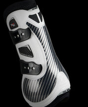 View of a white Premier Equine Carbon Pro Tendon Boot on a black background