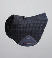 Side view of the Navy Premier Equine Close Contact Cotton Cross Country Saddle Pad on a plain background