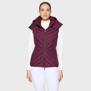 Front view of a female model wearing the Plum Samshield Chamonix Puffer Vest on a plain background