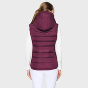 Back view of a female model wearing the Plum Samshield Chamonix Puffer Vest on a plain background