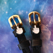 Close-up view of the Da Bird Mane Jane Spur Straps on a galaxy wallpaper background