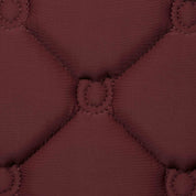 Close-up view of the quilting on the burgundy Equinavia Bergen Crystal All Purpose Pad